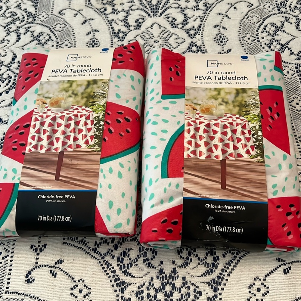 Mainstays watermelon design vinyl round 70” tablecloth. Two new in sleeve